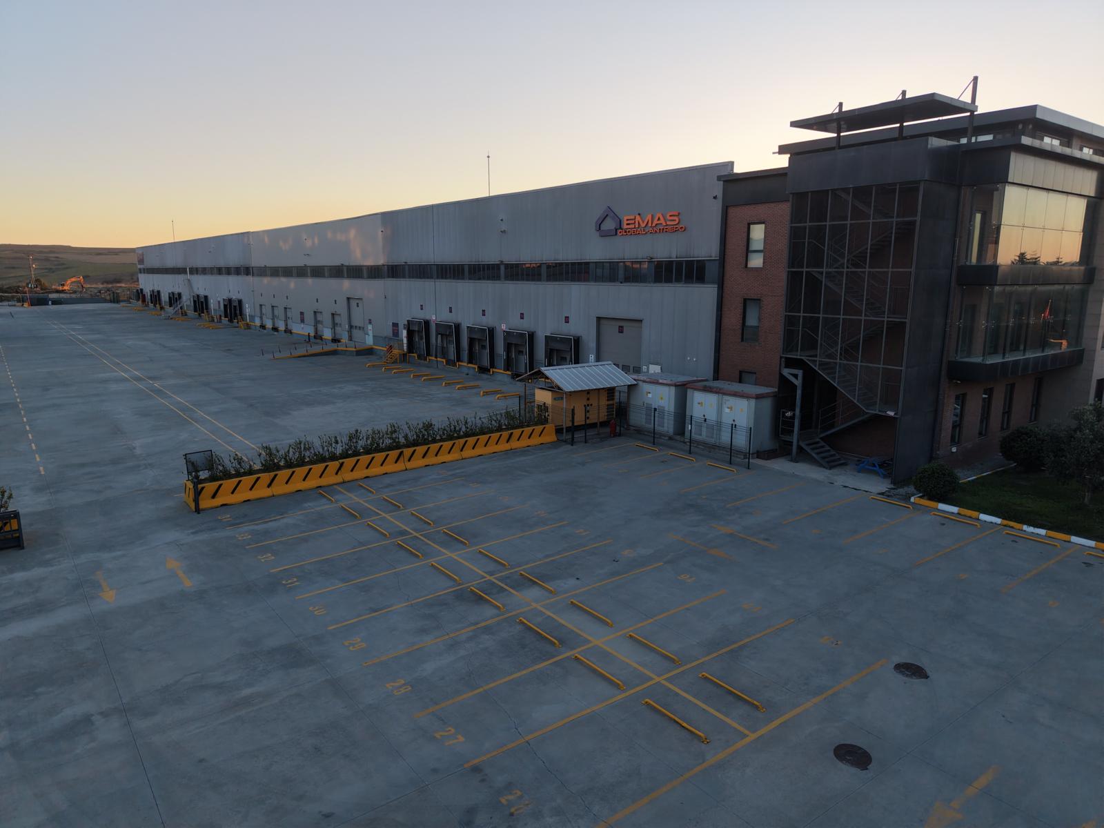 EMAS Global facility, loading doors and open yard